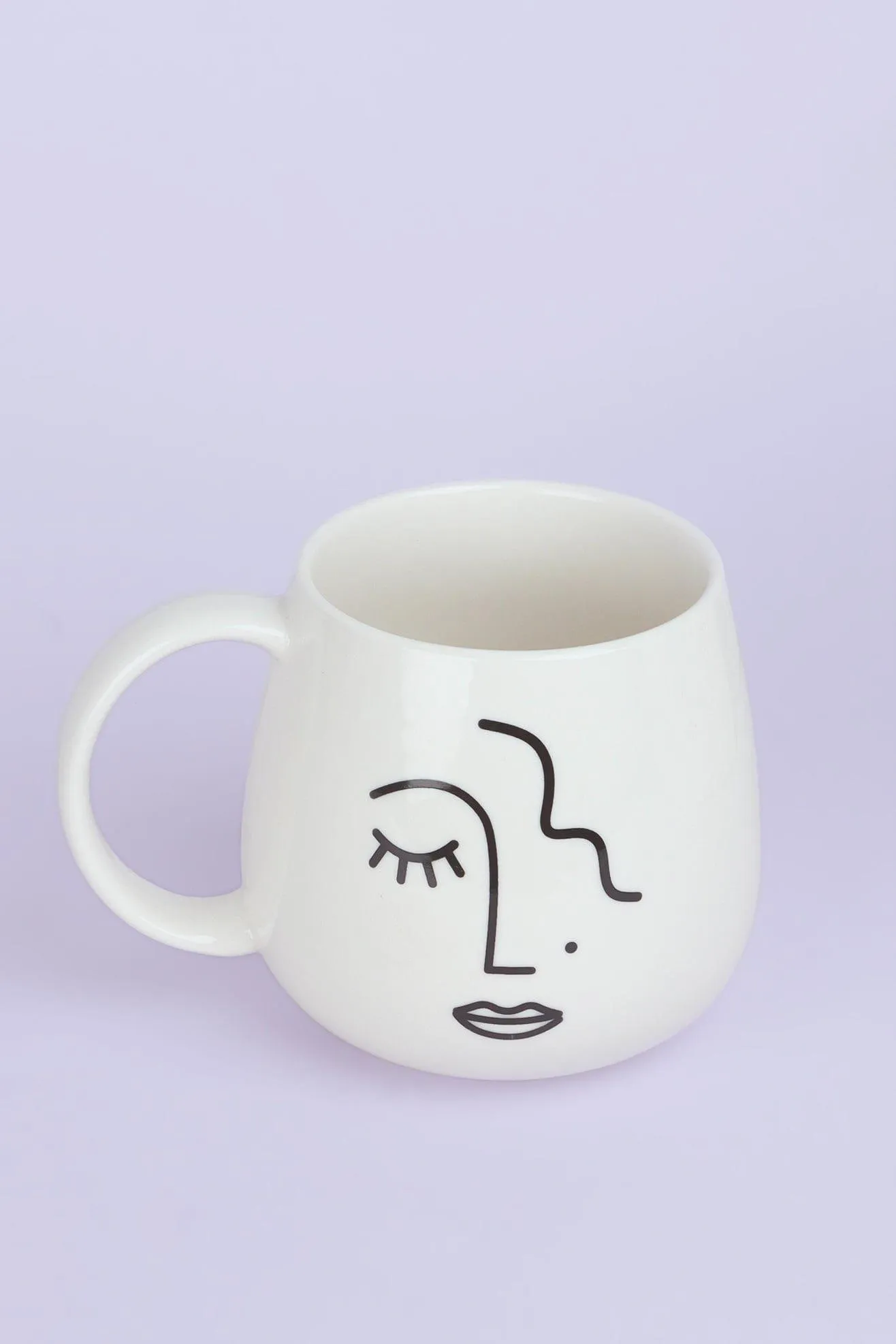 Large Mug with Abstract Face Design